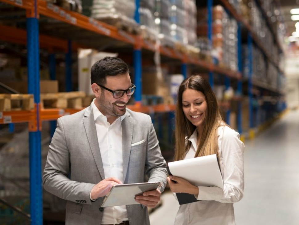 demo-attachment-868-managers-visiting-storage-center-discussing-about-distribution-goals-year